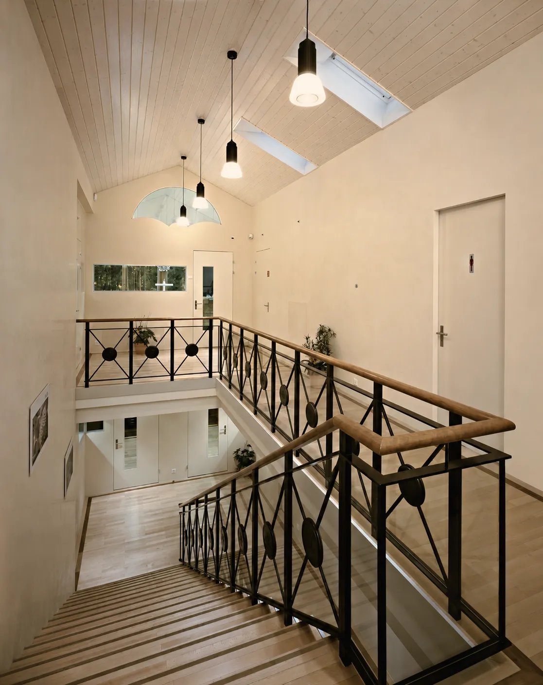 Staircase landing and glazed gallery at Blancpain