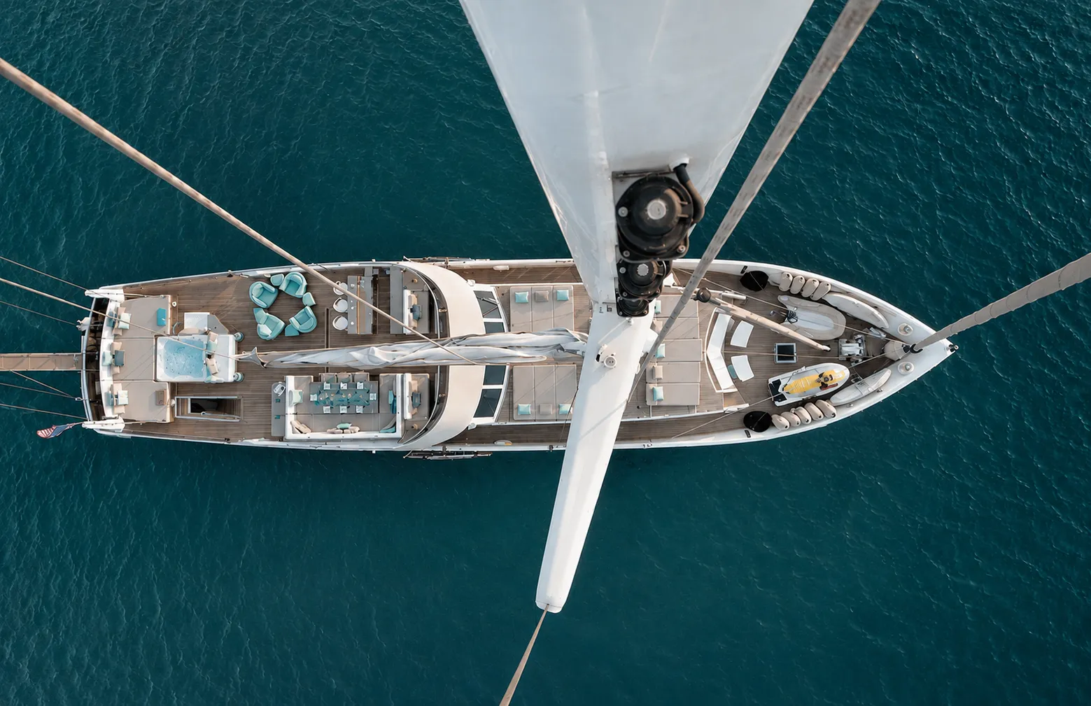 Aerial view of M/Y Mermaid anchored in turquoise water