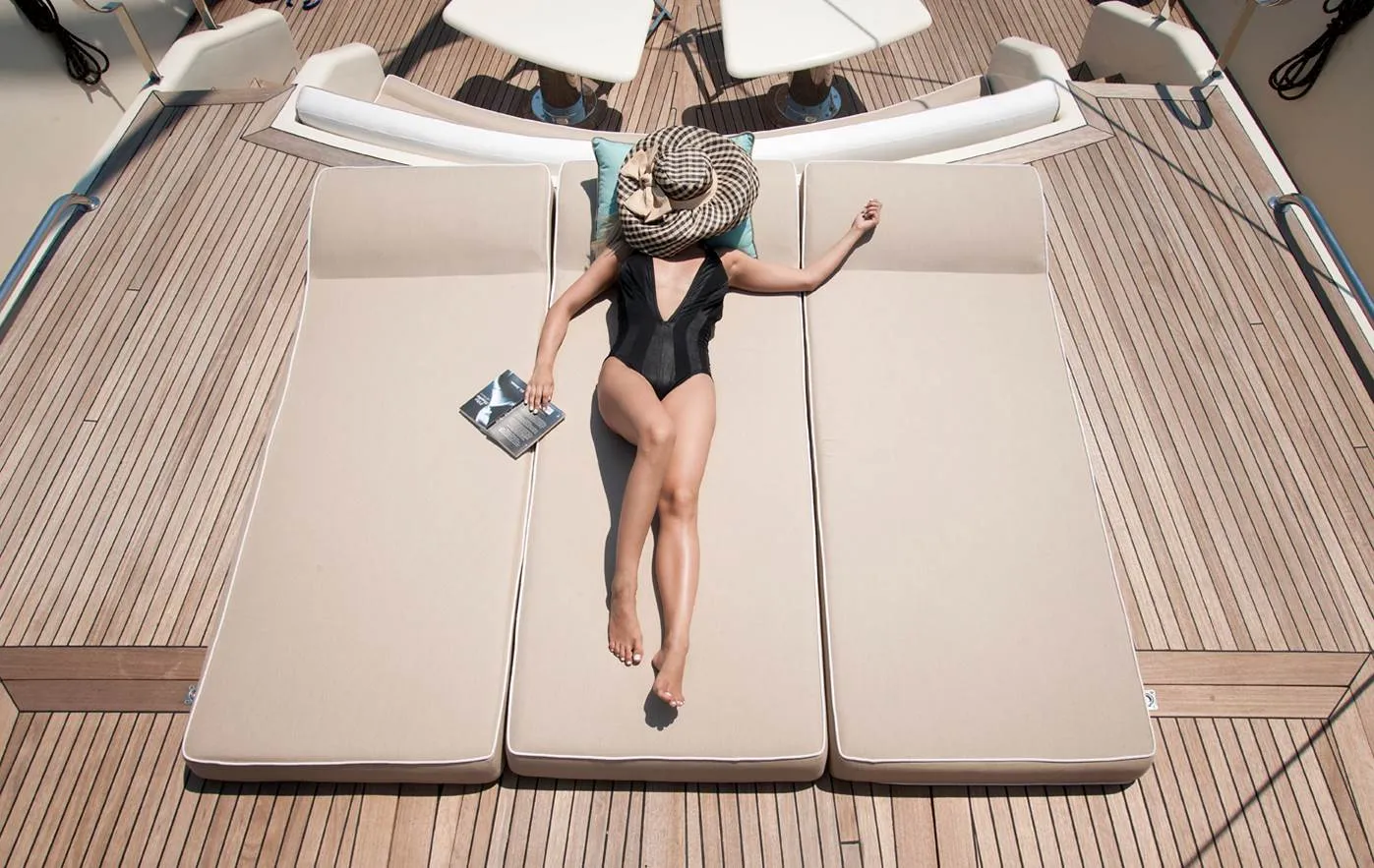 Guests relaxing on deck aboard M/Y Mermaid