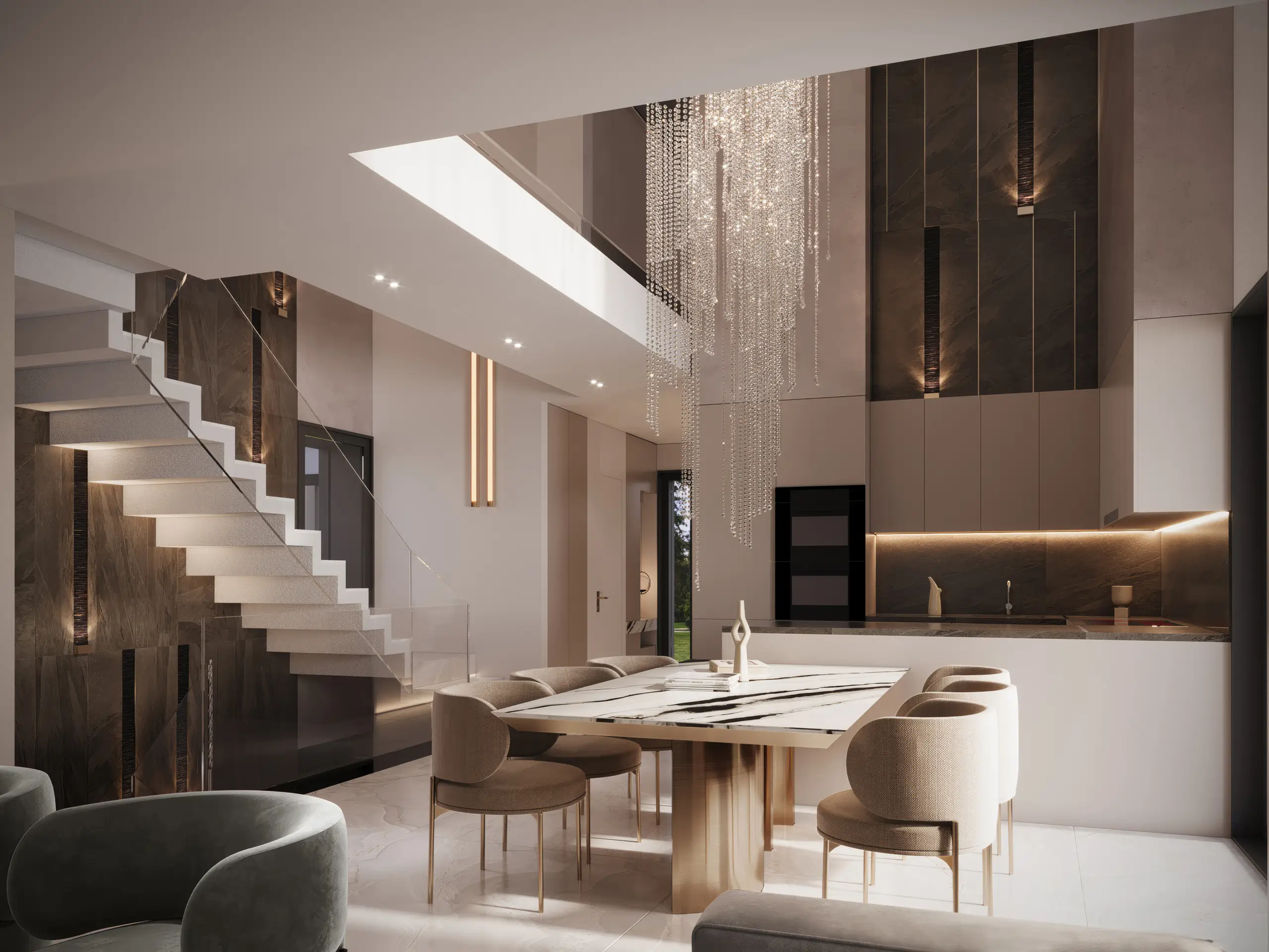 Villa D open-plan kitchen and dining area beneath a skylight, with a cascading crystal chandelier over a marble table and curved upholstered chairs